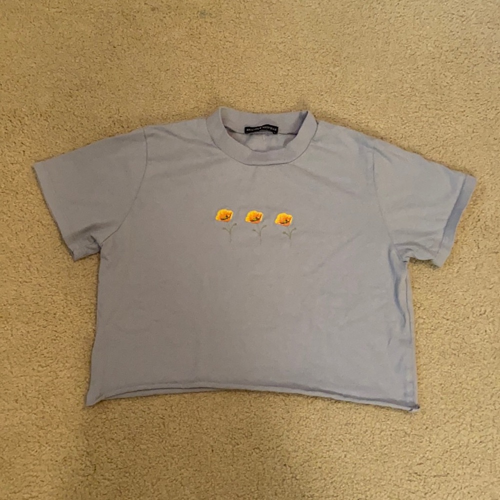 Blue shirt with yellow flowers